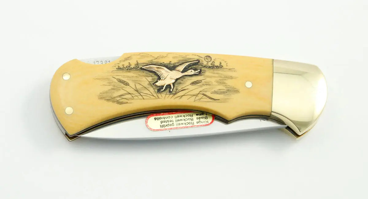 (Raritäten) Puma 4-Star 715 mit Messingeinlagen Ente und Fasan, Garantiekarte, 1983