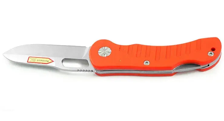 PUMA IP Jagdtaschenmesser Orange I Klingendetail weissem Hintergrund, rostfreier Stahl