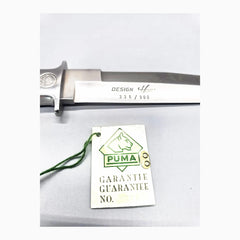 Detailaufnahme der Seriennummer 336/500 und der PUMA Garantiekarte Nr. 336