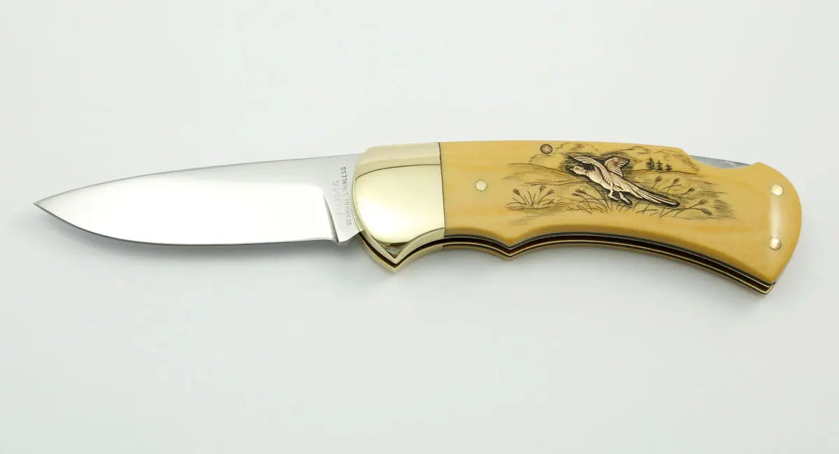 (Raritäten) Puma 4-Star 715 mit Messingeinlagen Ente und Fasan, Garantiekarte, 1983