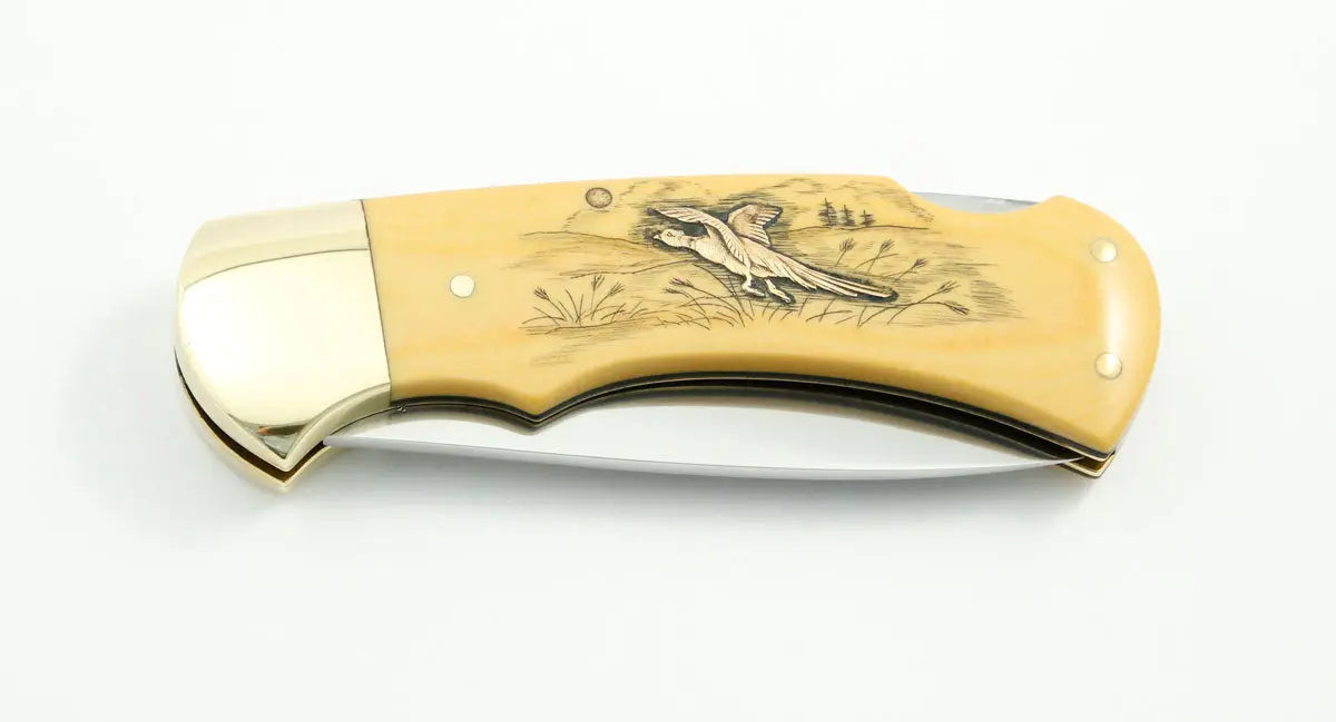 (Raritäten) Puma 4-Star 715 mit Messingeinlagen Ente und Fasan, Garantiekarte, 1983