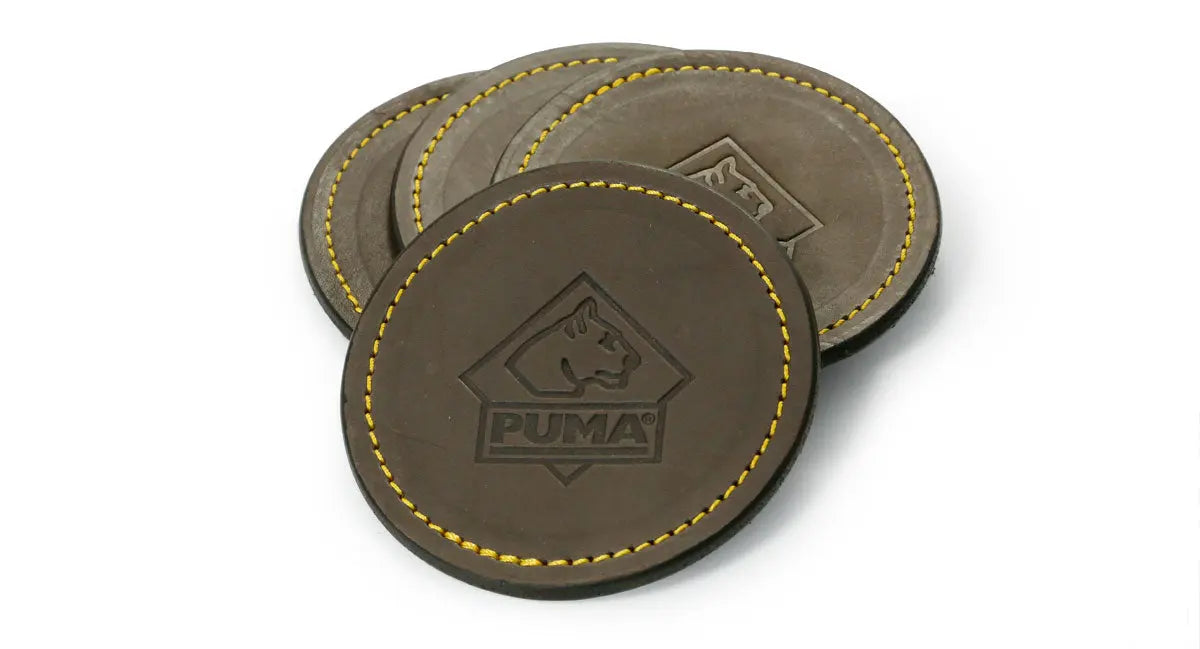 PUMA Leder-Untersetzer mit Goldnaht 4er-Set