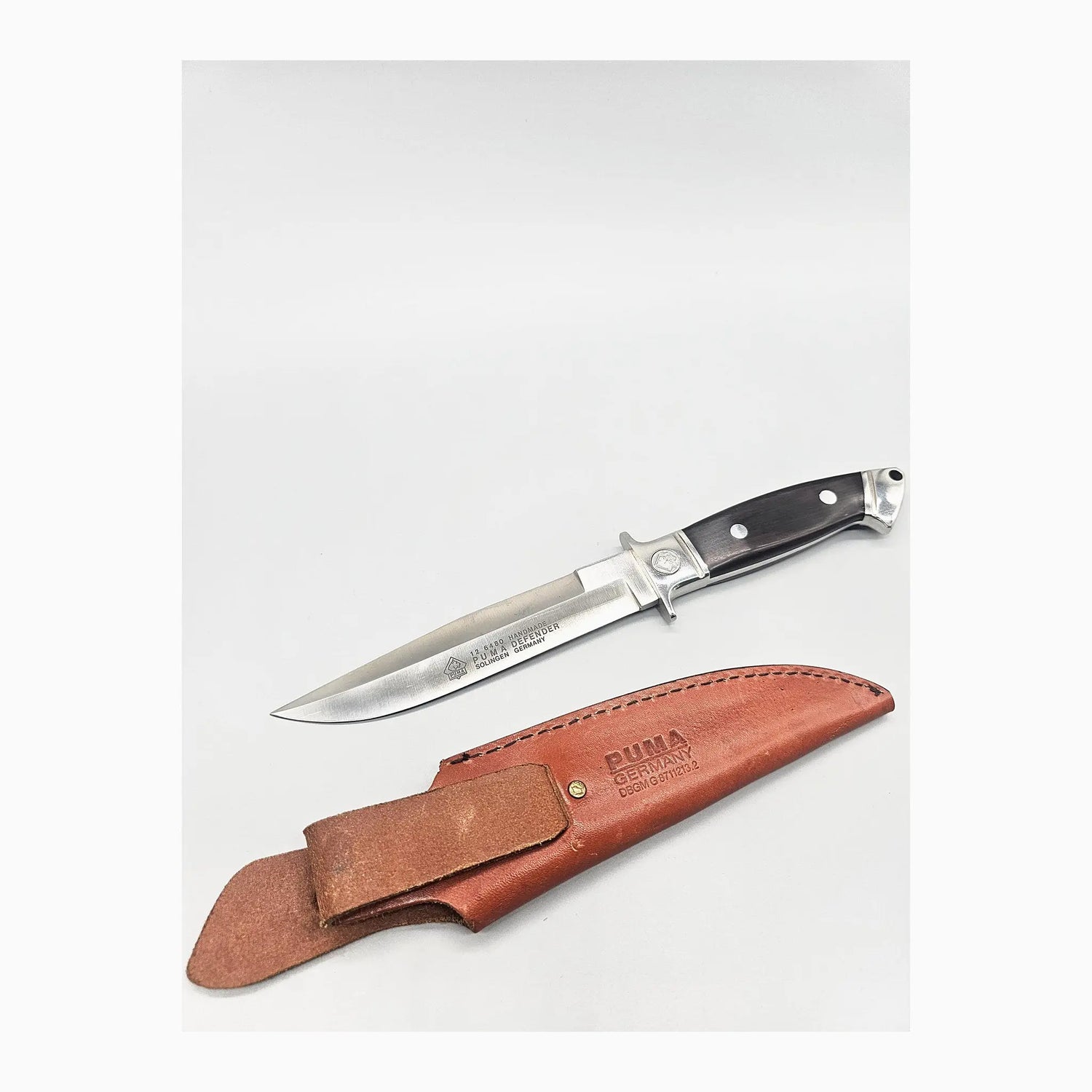 PUMA Defender 12 6480 Messer mit Original-Lederscheide, Sammlerstück Nr. 336/500